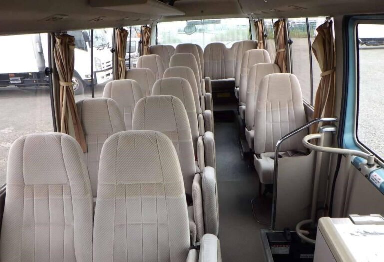 Toyota Coaster Bus with Turiken Tours and Car Rental